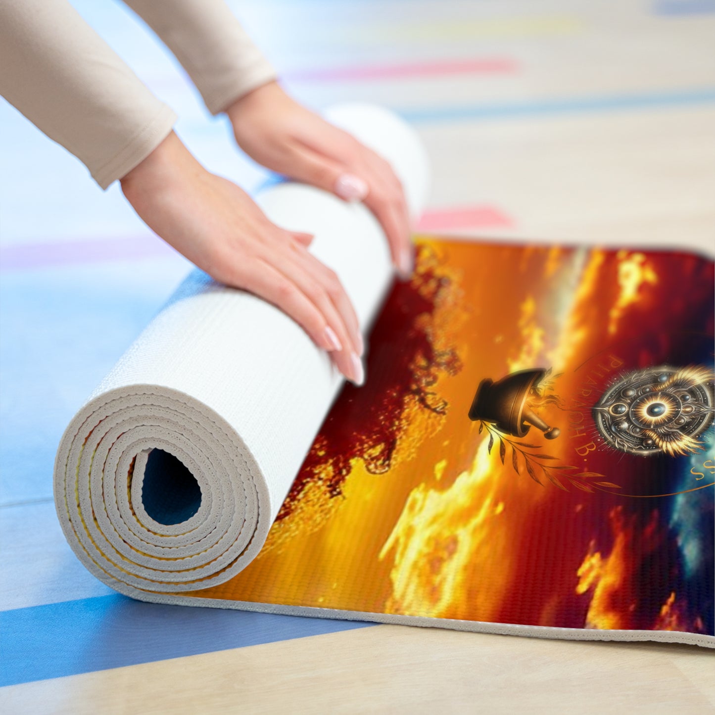 Person unrolling a yoga mat with a colorful design on a blue surface